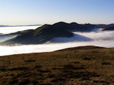 From Allermuir, morning mist below Turnhouse, Carnethy and Scald Law